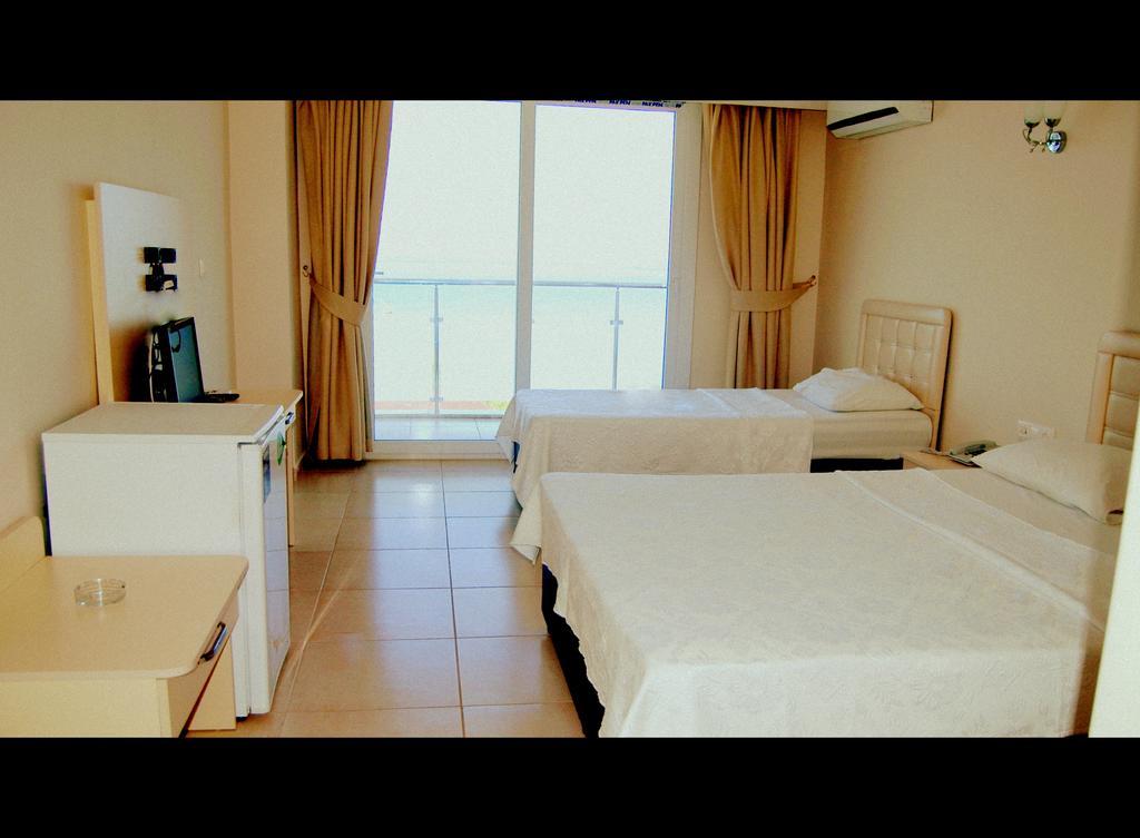 Club Casmin Hotel อิสเกนเดรุน ห้อง รูปภาพ